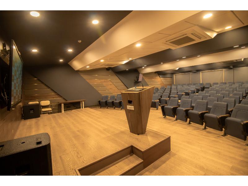 a podium - Dr. D. Y. Patil B-school college