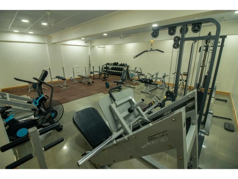 a gym with exercise equipment at Dr. D. Y. Patil B-school college