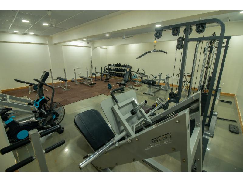 a gym with exercise equipment at Dr. D. Y. Patil B-school college