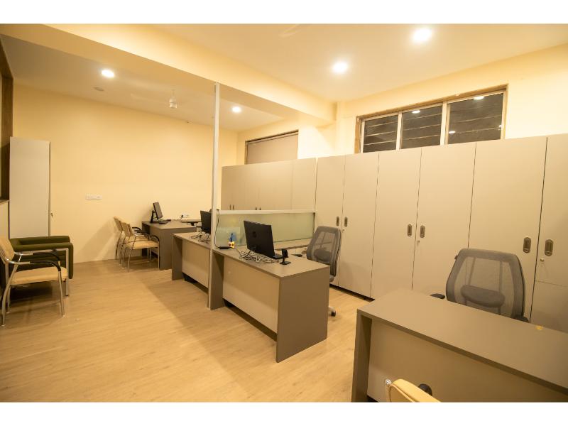 a room with desks and chairs